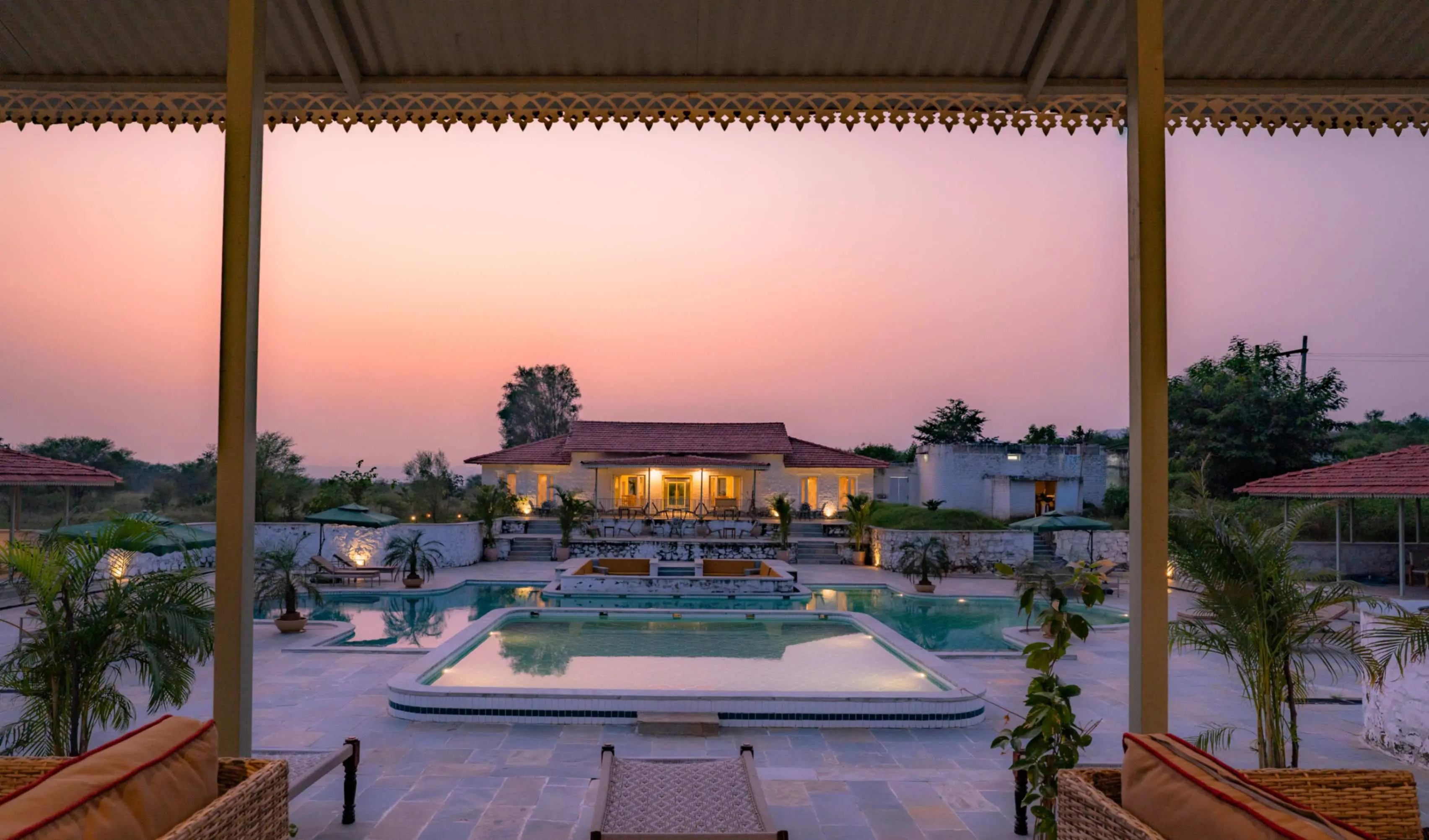 Kadamb Bagh Sariska Resort Pool and Cottages at Sunset